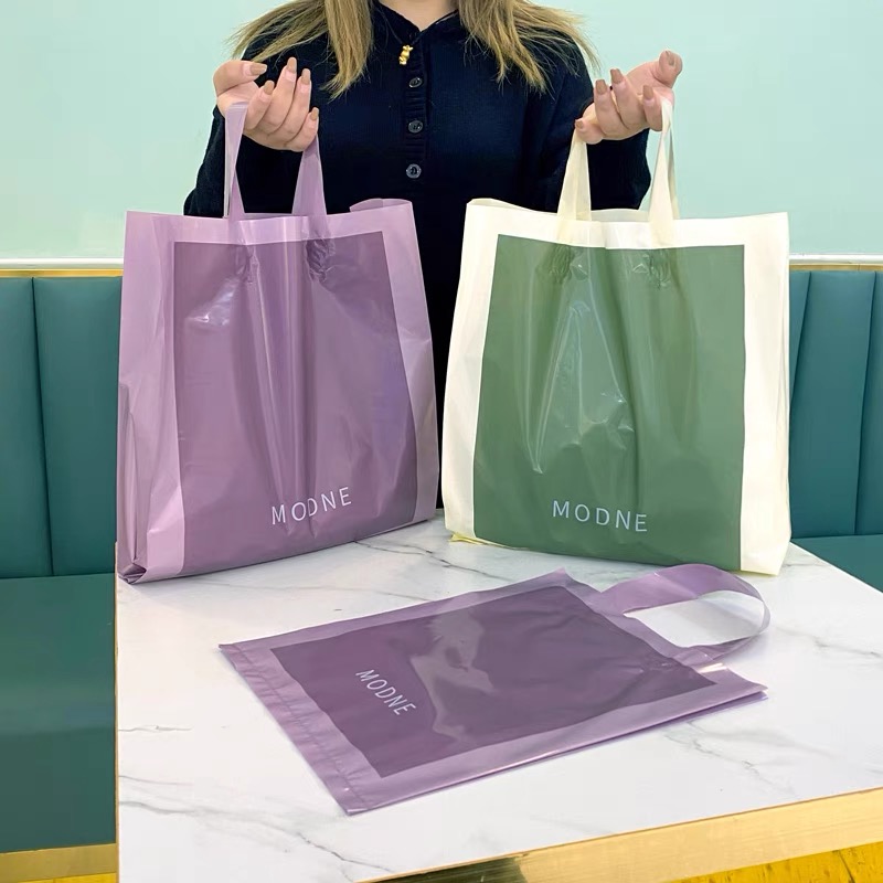加厚小清新化妆品包装袋礼品手提袋定做塑料袋服装店紫色袋绿色子